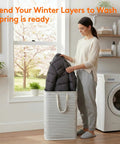 Woman using Two Pack Large Collapsible Laundry Hampers 80L Each Freestanding Waterproof Interior Foldable Laundry Baskets in grey