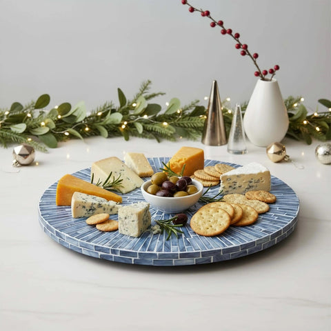 12.6 inch mother of pearl lazy susan turntable with blue starburst design, decorative rotating tray with cheese and crackers.