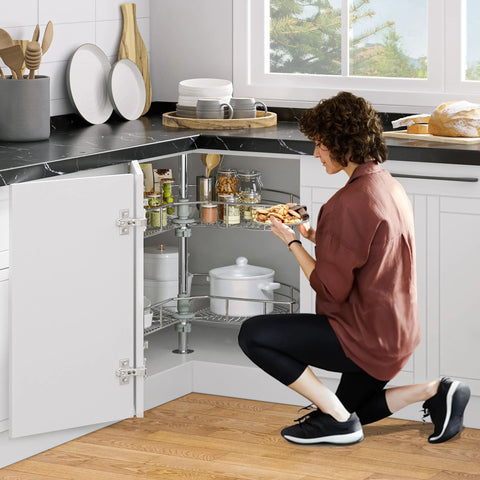 Woman using 28 Inch Kidney Shaped Chrome Pie Cut Lazy Susan Corner Organizer For Kitchen Base Cabinets With 270 Degree Rotation