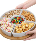 Divided Serving Dish Lazy Susan with 360 Degree Rotating Porcelain Tray on Bamboo Base and Five Removable Compartments filled with snacks