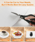 Scissors cutting a 2 Pack 26 Inch Lazy Susan Shelf Liner With Upgraded Composite Materials Circle Liner For Kitchen Cabinets
