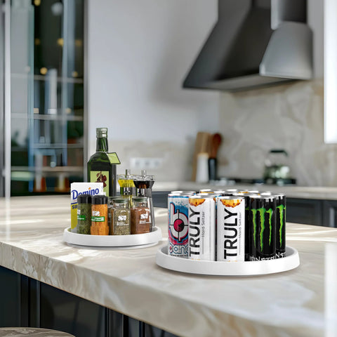 Four Pack Lazy Susan Spice Organizer Rotating Tray Set on kitchen counter with cans and spices, two 10-inch and two 12-inch trays shown.