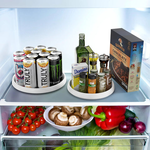 Four Pack Lazy Susan Spice Organizer Rotating Tray Set for kitchen pantry refrigerator, holds spices and condiments, visible in refrigerator setup