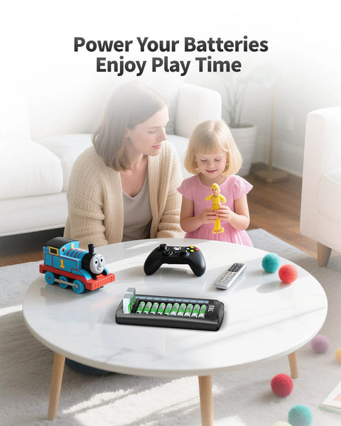 12 Bay LCD Battery Charger for AA or AAA and 9V with 10 AA or AAA and 2 9V Slots on a table with toys and a remote control.