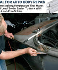 Person using Lead Alloy Solder Rods For Car Body Repair 30 70 Tin Lead on auto body panel, demonstrating welding process.