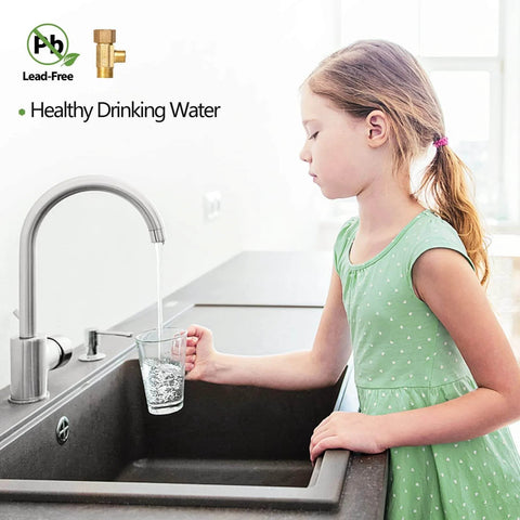 Girl filling glass at kitchen sink with Lead Free Brass Three Eighth Inch Angle Stop Add A Tee Compression Tee Valve With Three Eighth Inch Inlet And Outlet Connections Two Pack For Residential And Commercial Potable Water Applications visible.