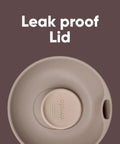 Top view of beige leak-proof SmoothSip slider lid for 12 oz insulated stainless steel tumbler, emphasizing lid's design feature.