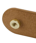 Close-up of Leather Drawer Pull from Set Of 6 in Brass Brown, showing genuine leather strap and zinc alloy button on cabinet hardware.