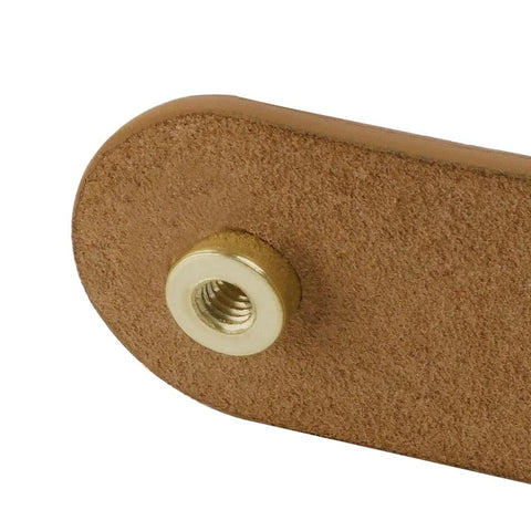 Close-up of Leather Drawer Pull from Set Of 6 in Brass Brown, showing genuine leather strap and zinc alloy button on cabinet hardware.