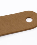 Close-up of Leather Drawer Pulls Set Of 6 In Brass Brown For Wardrobe Kitchen And Bathroom Cabinets with genuine leather detail.