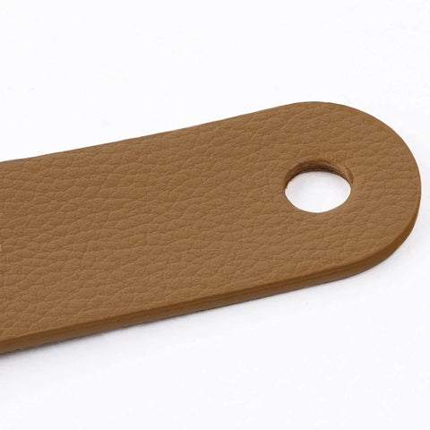 Close-up of Leather Drawer Pulls Set Of 6 In Brass Brown For Wardrobe Kitchen And Bathroom Cabinets with genuine leather detail.