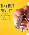 Leatherman Micra Keychain Multi Tool With Scissors And Knife Compact Stainless Steel EDC Tool held by a person