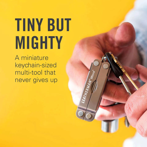 Leatherman Micra Keychain Multi Tool With Scissors And Knife Compact Stainless Steel EDC Tool held by a person