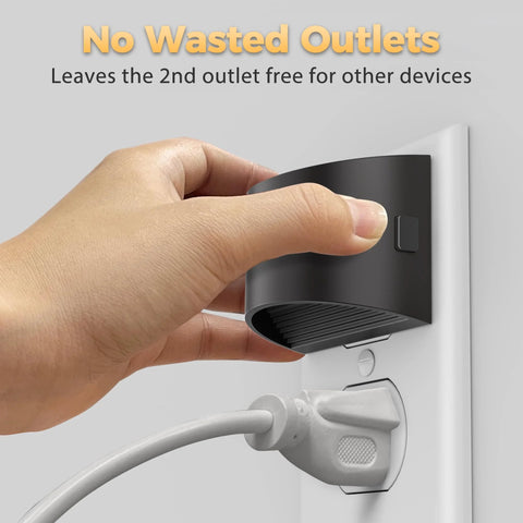 Plugging Two Pack Led Night Light Plug In With Dusk To Dawn Sensor Three Level Brightness into wall outlet, leaving space for cords.