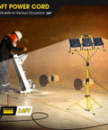 Worker using 21000 Lumen LED Work Light With Stand 3 Head Portable Tripod Light With 16 Foot Cord IP66 Waterproof indoors