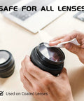 Person cleaning camera lens with Anti Fog Glasses Wipes Pack 120 PreMoistened Lens Cleaner For Glasses Sunglasses