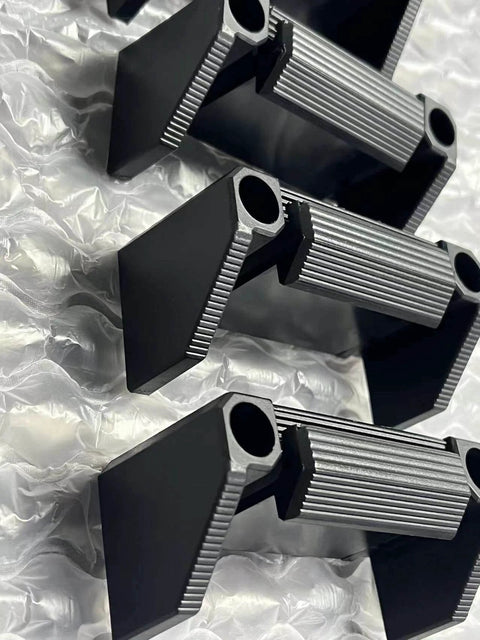 Close-up of Heavy Duty Level Holder And Bracket Storage Rack 4 Pack Universal Wall Mount for Rulers and Tools, durable plastic.