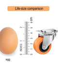 Life-size comparison of 1.5" Casters Set of 8 - Swivel Plate Universal Caster Wheels, Orange Polyurethane (PU) next to an egg.