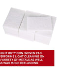 Stack of Light Cleansing Hand Pad 6x9 Mild Abrasive for Metal Vinyl Porcelain Pack of 20, showing nonwoven texture