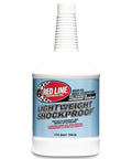 Front view of Red Line Race-Grade Lightweight Shockproof Gear Oil 58404 for cold weather shifting in 1 quart bottle.