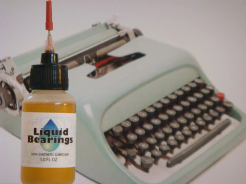 Liquid Bearings, SUPERIOR 100%-synthetic oil for lubrication of drones, RC vehicles, placed next to vintage typewriter