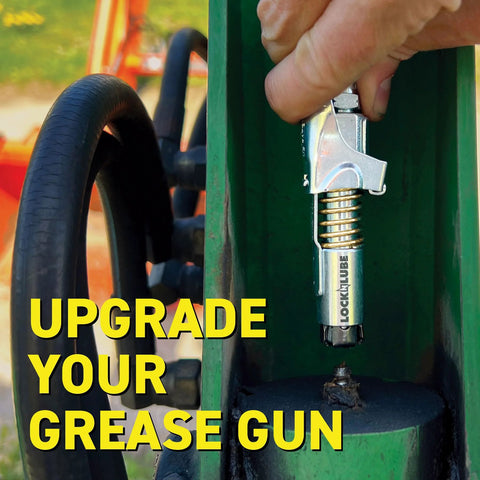 Locking Grease Gun Coupler clamps on zerk fitting, 10000 PSI rated, shown in use on heavy machinery with hand operating tool.