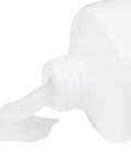 Close-up of LubeTube 4oz - Multipurpose Synthetic Grease for Pool Equipment, PFAS-Free, ceramic-enhanced, white grease texture in bottle