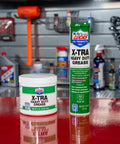 Lucas Oil 14.5 Ounce 10301 Heavy Duty Grease in a workshop setting