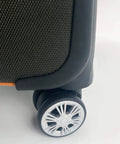 Close-up of a suitcase showing a black and silver wheel from the Luggage Replacement Wheels Set with 2 Wear Resistant Suitcase Wheels Made from TPE.