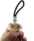 Person holding luminous TPU zip puller from 8 Piece Luminous Tail Cord Zip Puller Set For Outdoor Backpacks 42x44mm Heavy Duty TPU Extenders