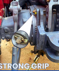 Installed lynch pin securing hitch on tractor, part of Six Piece Lynch Pin Kit With Ring For Trucks Trailers Tractors Lawnmowers Trolleys And More 5/16 By 1-3/4 Inch Stainless Lynch Pins Assortment For Safe Hitch Retention And Wheel Lock Durable Quick Pin Retainers For Heavy Duty Use.
