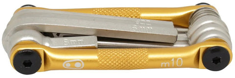 Crankbrothers Multi Tool M10 Gold Compact Trailside Essential with hex wrenches and screwdrivers, ergonomic side grips visible