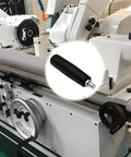 Close-up of Two Pack M10 Revolving Hand Knob with plastic housing and metal nut for lathe tailstock table saw, shown on machinery.