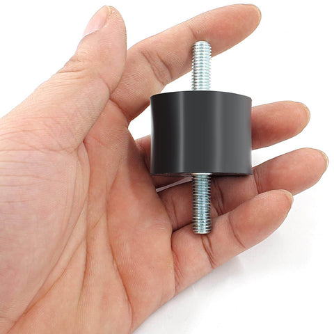 Hand holding one of four Pcs M10 Rubber Shock Absorber Anti Vibration Isolator Mounts For Diesel Engines Harvester And Generator Durable Noise Dampening Heavy Duty Engine Mounts For Smooth Operation