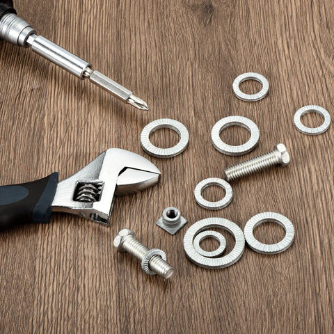 Tools and M10 Wedge Locking Washers for Bolts, Manganese Steel, 20 Pcs, DIN 25201 on wood surface