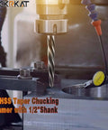 M2 HSS taper chucking reamer with 1/2 inch shank drilling into metal surface in workshop