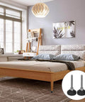 Adjustable M6 screw in furniture levelers with a swivel nylon rubber base installed on bed frame in modern bedroom