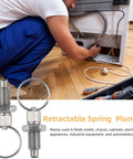 Six Pack M6 Stainless Steel Pull Ring Indexing Plungers installed in use with tools, showcasing retractable spring-loaded mechanism.
