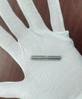 M6x40mm 304 Stainless Steel Double End Threaded Stud Screw Bolt 5Pcs held in a gloved hand, showcasing size and detail.