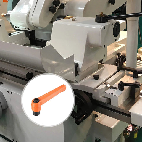 Set of 3 M8 Adjustable Clamping Lever Push Button Ratchet Handles with Female Threaded Studs shown on machinery setup.