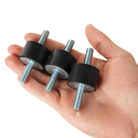 Hand holding three Eight M8 Rubber Vibration Isolator Mounts Cushion Machinery Absorb Shocks Reduce Noise And Protect Air Compressors