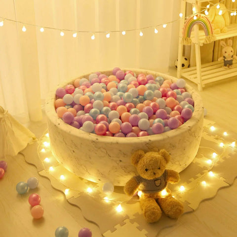 Ball Pit Balls - 100pcs - Crush Proof Plastic Children's Toy Balls Macaron Ocean Balls in a round play area with teddy bear