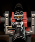 Close-up view of Magnetic Base Scope Leveling Tool for Gunsmithing and Maintenance by Wheeler Engineering mounted on a rifle scope.