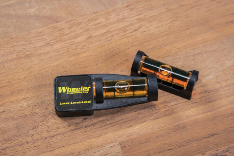 Magnetic Base Scope Leveling Tool For Gunsmithing And Maintenance By Wheeler Engineering adjustable leveling tool on wood surface