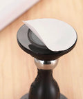 Close-up of Stainless Steel Door Clip Set 2 Pack Drill Free Door Stopper Screws with magnetic layer visible on top.