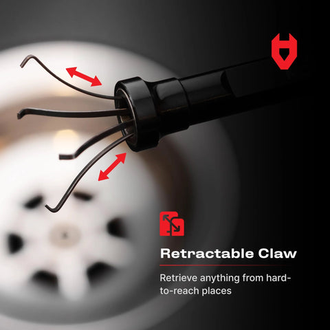 Close-up of flexible magnetic claw pickup tool with a bright LED light, showing 4-finger retractable claw above a drain.
