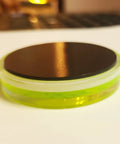 Side view of Magnetic Round Bubble Level Tool Pro Grade Bullseye Inclinometer, 60mm with acrylic housing and magnetic back.