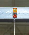 Compact Magnetic Stud Finder And Level With Bubble Vial for Wood and Metal Detection in use on metal frame