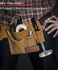 Man wearing tool belt with telescoping magnetic sweeper pickup tool with retractable reach from 8.6 inches to 33 inches.