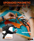 Person using a magnetic snap fastener tool kit with 100 snap sets, orange handles and cutting leather on a workspace table.